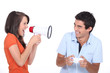 Girlfriend telling her boyfriend to stop playing video games