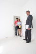 Estate agent with a young couple