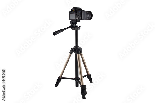 Photo: a tripod for video and photo shoot with a camera a tripod for video and photo shoot with a camera
