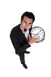 Man shouting with watch in hand