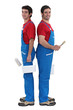 A team of painters standing back-to-back