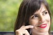 alluring woman at phone
