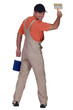 Handyman painting a wall