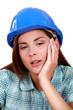 A tired-looking tradeswoman