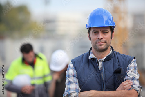 Photo: Confident foreman on construction site Confident foreman on construction site