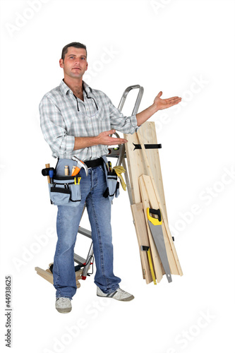 Photo: Carpenter stood in studio Carpenter stood in studio