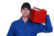 Portrait of a mechanic with toolbox