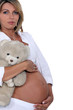 A pregnant woman.