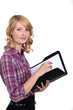 Casual female worker holding folder