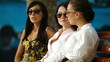Three female friends immersed in conversation