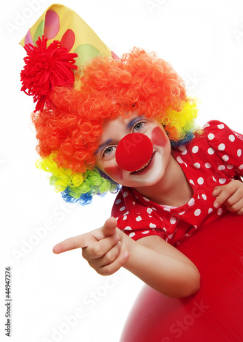 Photo: happy clown pointing on something happy clown pointing on something