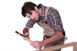 carpenter at work using hammer