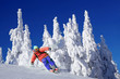 Foto: Skier skiing downhill in mountains Skier skiing downhill in mountains