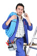 Plumber with materials, toolbox and cellphone