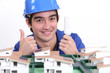 Electrician holding bulb