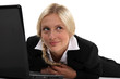 Cute businesswoman with a laptop