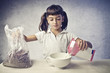 Foto: Child Having a Breakfast Child Having a Breakfast