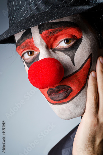 Photo: Businessman with clown wig and face paint Businessman with clown wig and face paint