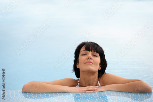 Photo: Woman in a swimming pool Woman in a swimming pool