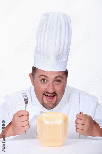 Photo: chef eating hamburger chef eating hamburger