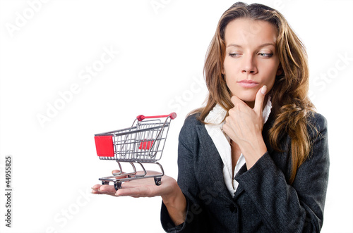 Photo: Attractive businesswoman with shopping cart Attractive businesswoman with shopping cart