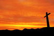 cross silhouette and the clouds at sunset