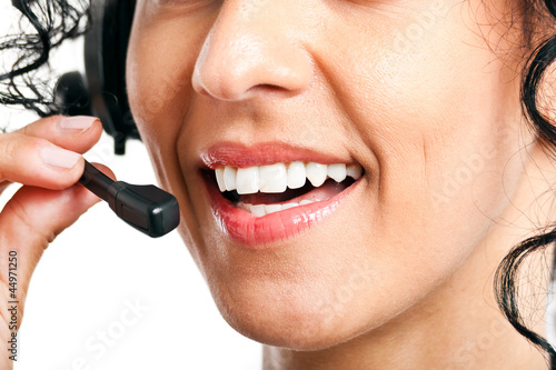 Foto: Closeup of a female call center operator Closeup of a female call center operator