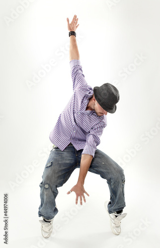 Photo: hip hop dancer isolated over white background hip hop dancer isolated over white background