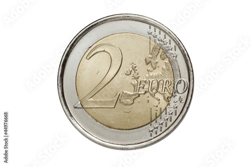 Photo: A two euros coin isolated on a white background A two euros coin isolated on a white background