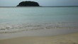 People walking on a tropical and exotic beach in Thailand