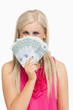 Photo: Blonde in pink holding 100 euros banknotes Blonde in pink holding 100 euros banknotes