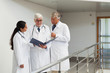 Three doctors talking