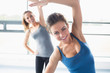 Women stretching their arms