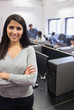 Photo: Woman standing at the front and smiling Woman standing at the front and smiling