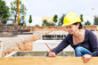 Measure engineer at the construction site