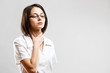 Photo: Young woman whit sore throat Young woman whit sore throat
