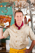 Working in butchers shop with barbeque meat