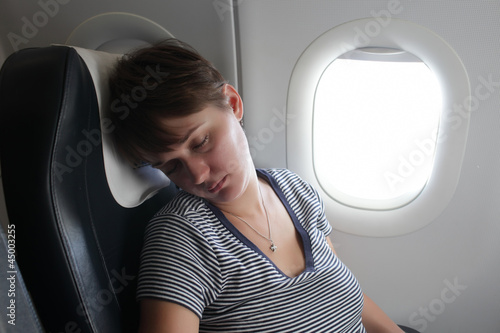 Photo: Woman at airplane Woman at airplane