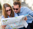 Tourists looking at a map