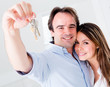 Couple holding keys