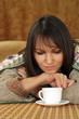 Pretty Caucasian woman on a sofa