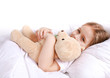 Foto: Cute girl cuddling with teddy bear Cute girl cuddling with teddy bear