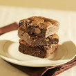 Photo: Stack of brownies on a plate. Stack of brownies on a plate.