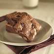 Photo: Stack of brownies on a plate. Stack of brownies on a plate.