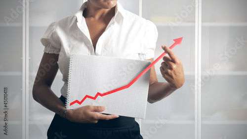 Photo: Businesswoman helps statistics Businesswoman helps statistics