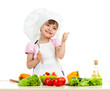 Photo: Chef girl preparing healthy food over white background Chef girl preparing healthy food over white background