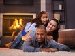 Beautiful mixed race family at home smiling