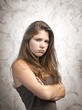 Angry woman on a textured background