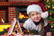 girl with gingerbread house