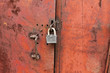 Photo: padlock on the rusty door padlock on the rusty door